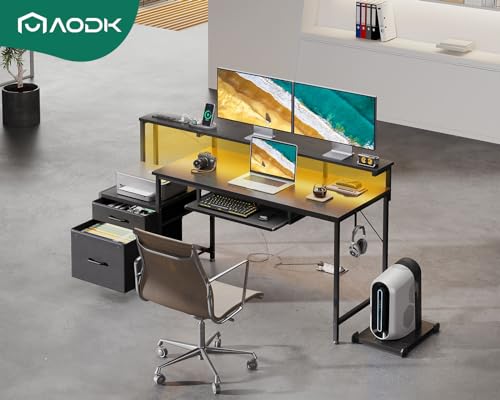 AODK 55 Inch Gaming Desk with Power Outlets & LED Light, Reversible Computer Desk with File Cabinet and Fabric Drawer, Office Desk with Keyboard Tray, Table with Full Monitor Riser and PC Stand, Black AODK
