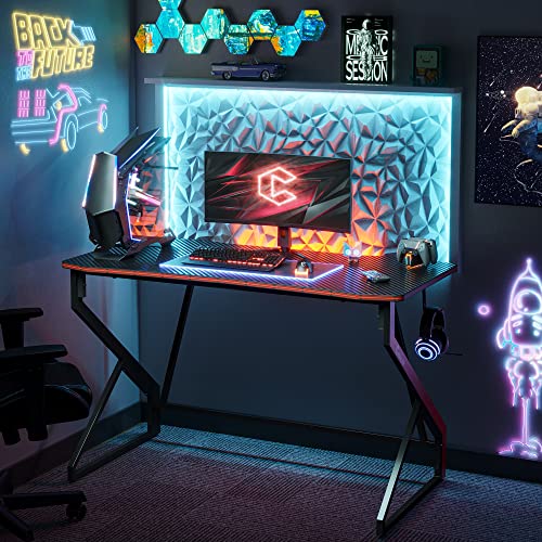CubiCubi Simple Gaming Desk Z Shaped 47 inch Gamer Workstation, Home Computer Carbon Fiber Surface Gaming Desk PC Table with Headphone Hook CubiCubi