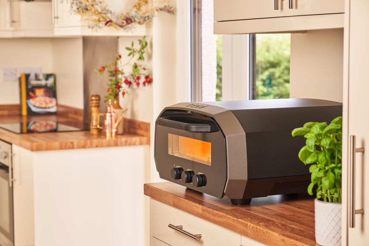 Ooni Volt 12 Electric Pizza Oven - Indoor & Outdoor Versatile Electric Oven, Pizza Cooker with Stone, Indoor and Outdoor Toaster Oven Countertop, Portable Pizza Oven, Cook 12 Inch Pizzas and More ooni