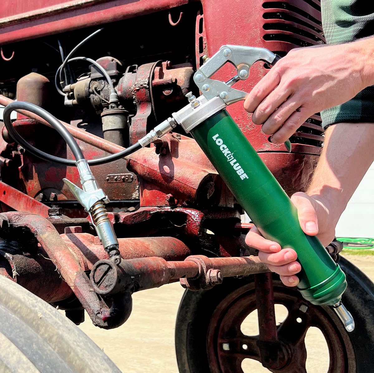 LockNLube Heavy-Duty Pistol Grip Grease Gun. Includes our patented LockNLube® Grease Coupler (Locks On, Stays On, Won't Leak!) plus a high-quality 20" hose and in-line hose swivel LockNLube