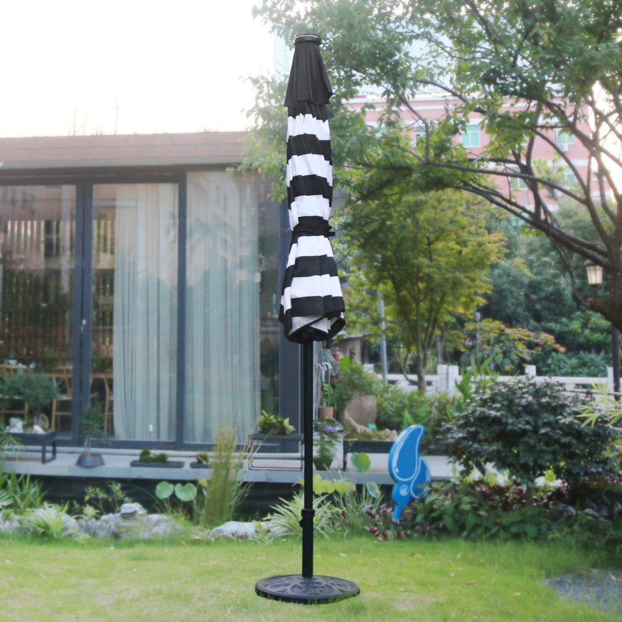 Sunnyglade 9' Solar 24 LED Lighted Umbrella with 8 Ribs Adjustment and Crank Lift System for Patio - Black and White Sunnyglade