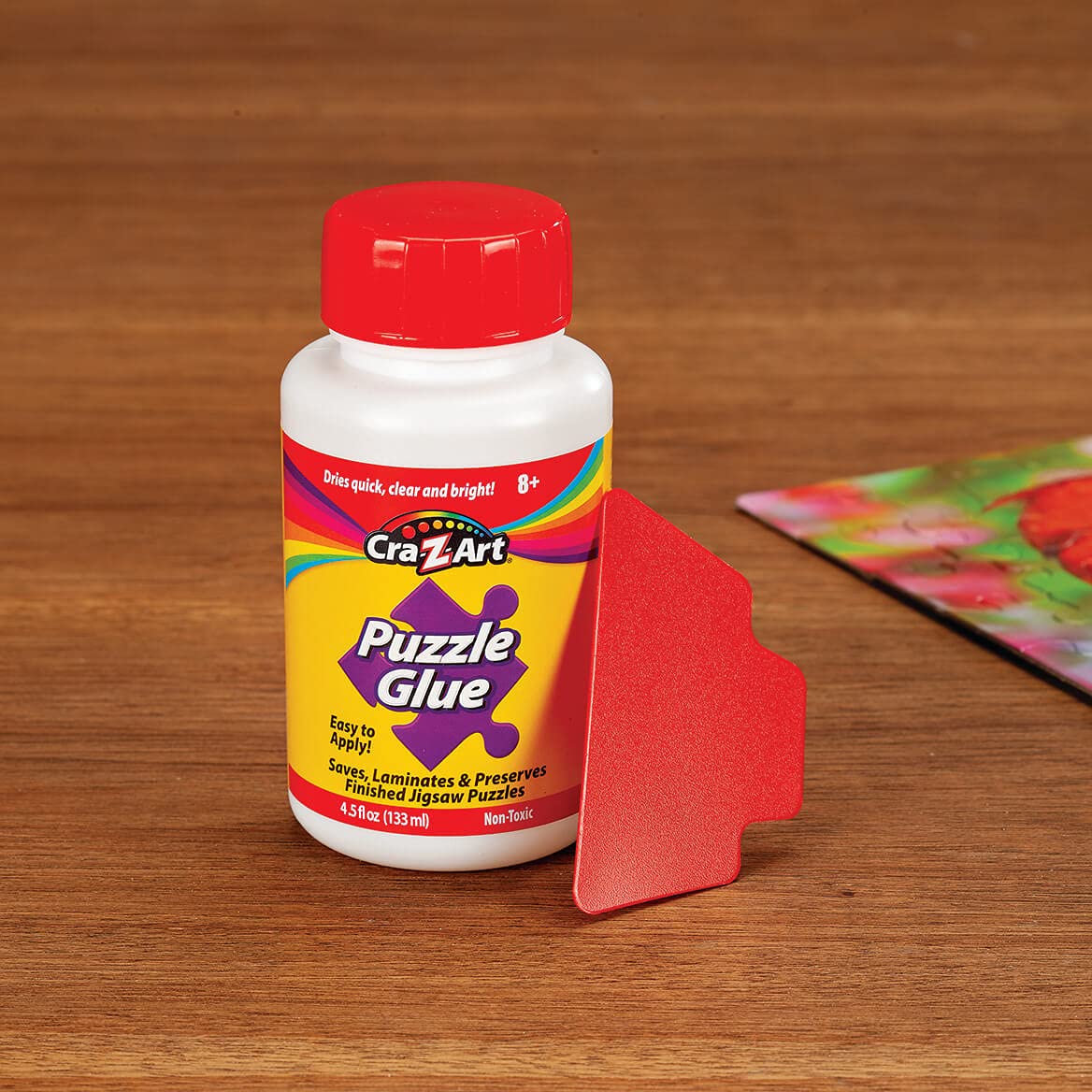 RoseArt Jigsaw Puzzle Glue with Applicator - Saves, Laminates and Preserves Finished Jigsaw Puzzles - Easy to Apply, Dries Quick, Clear & Bright RoseArt