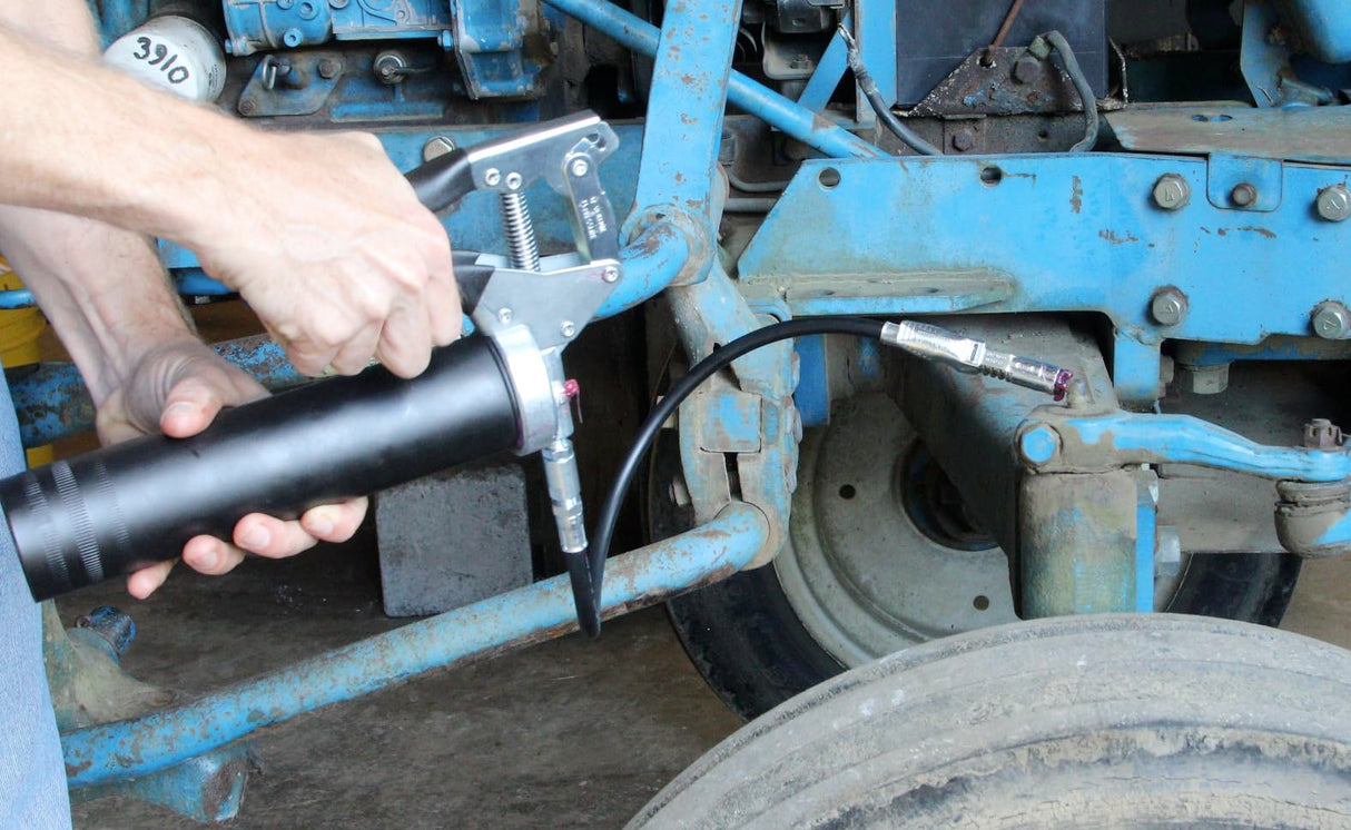 LockNLube Easy-Prime Pistol-Grip Grease Gun. Includes Our Patented Grease Coupler (Locks on, Stays on, Won't Leak!) Plus a 20" Hose and in-line Hose Swivel. LockNLube