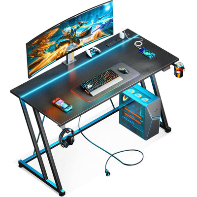MOTPK Gaming Desk with LED Lights & Power Outlet, Computer Desk 47inch for Small Space, Cheap Gaming Table with Carbon Fiber Texture, Kids Desk Gift for Boys Men, Black