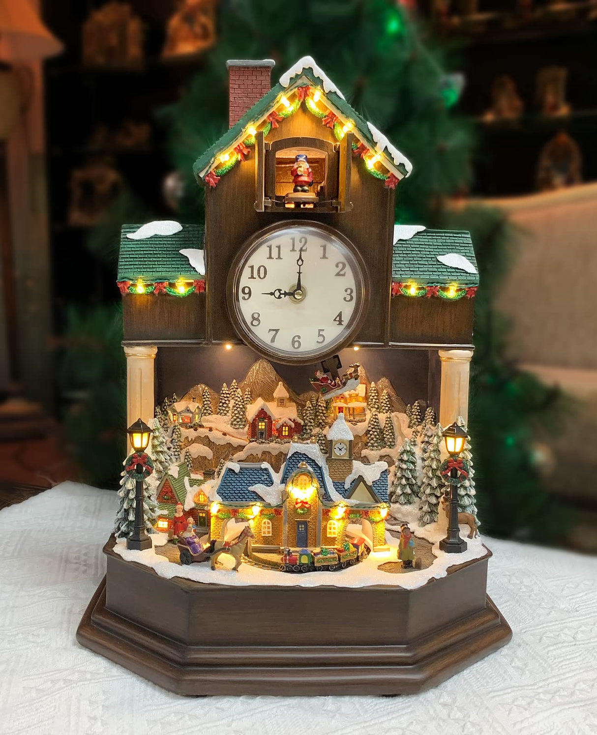 MOMENTS IN TIME 17.1" H Christmas Decor Cuckoo Clock with Christmas Village Scene, with LED Lights, Christmas Music, and Animation - Power Adapter (Included) MOMENTS IN TIME