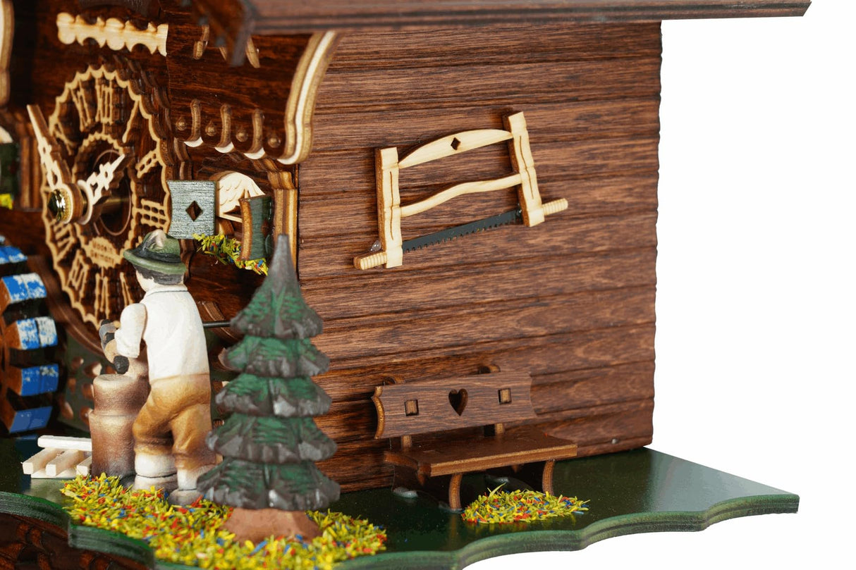 Trenkle Quartz Cuckoo Clock Black Forest House with Moving Wood Chopper and Mill Wheel, with Music TU 4217 QM Trenkle