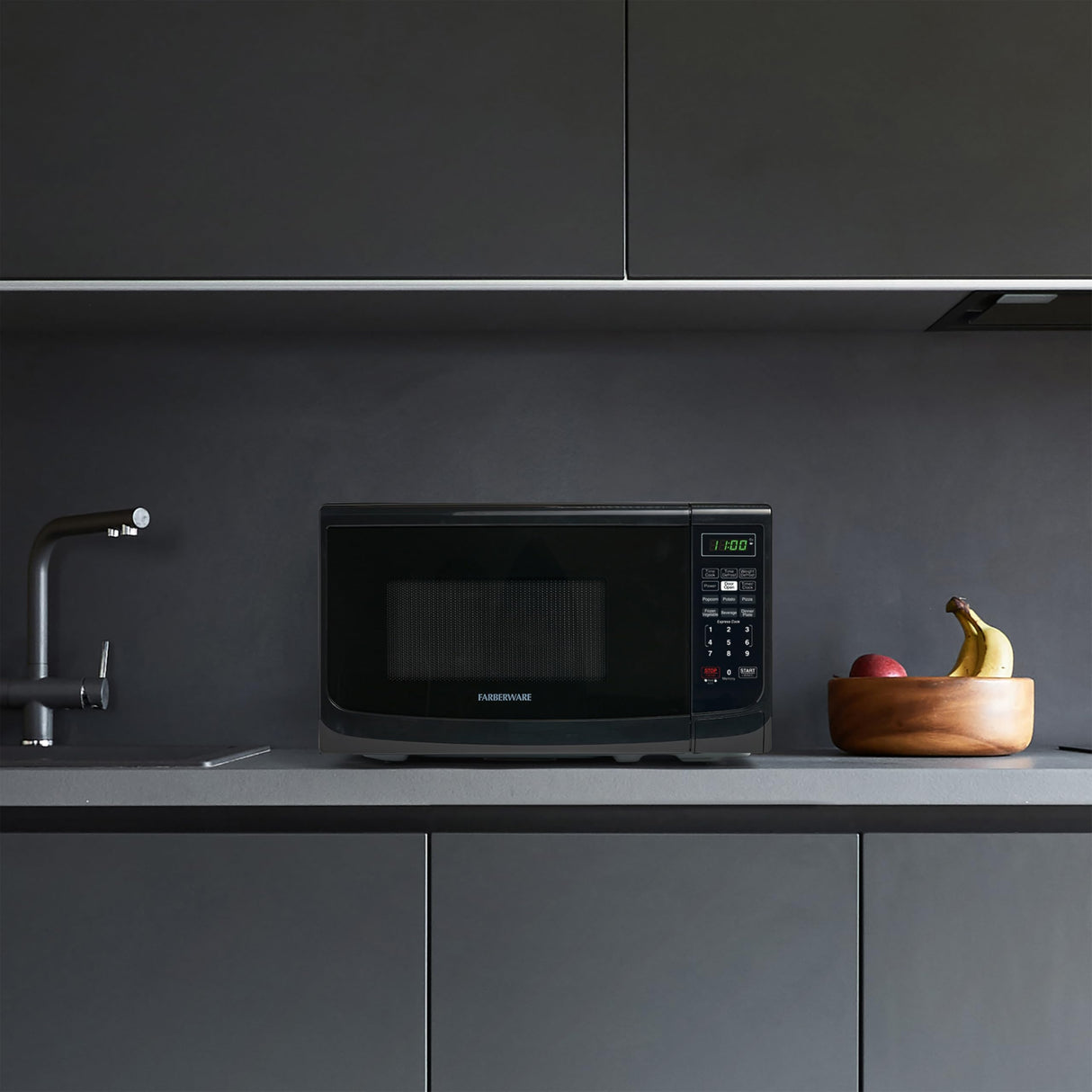 Farberware Countertop Microwave 700 Watts, 0.7 Cu. Ft. - Microwave Oven With LED Lighting and Child Lock - Perfect for Apartments and Dorms - Easy Clean Grey Interior, Retro Black Farberware