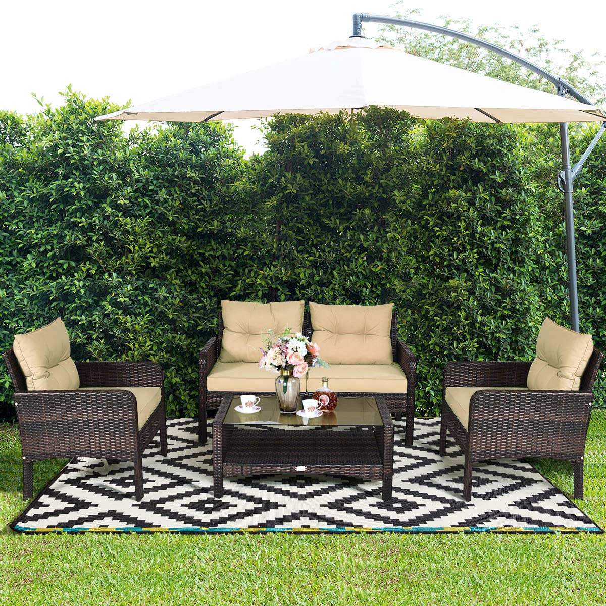 Tangkula 4 Piece Patio Furniture Set, Outdoor Wicker Conversation Set with Glass Top Coffee Table, All Weather Proof and Thick Cushions, Suitable for Porch, Garden, Poolside and Lawn (Brown) Tangkula