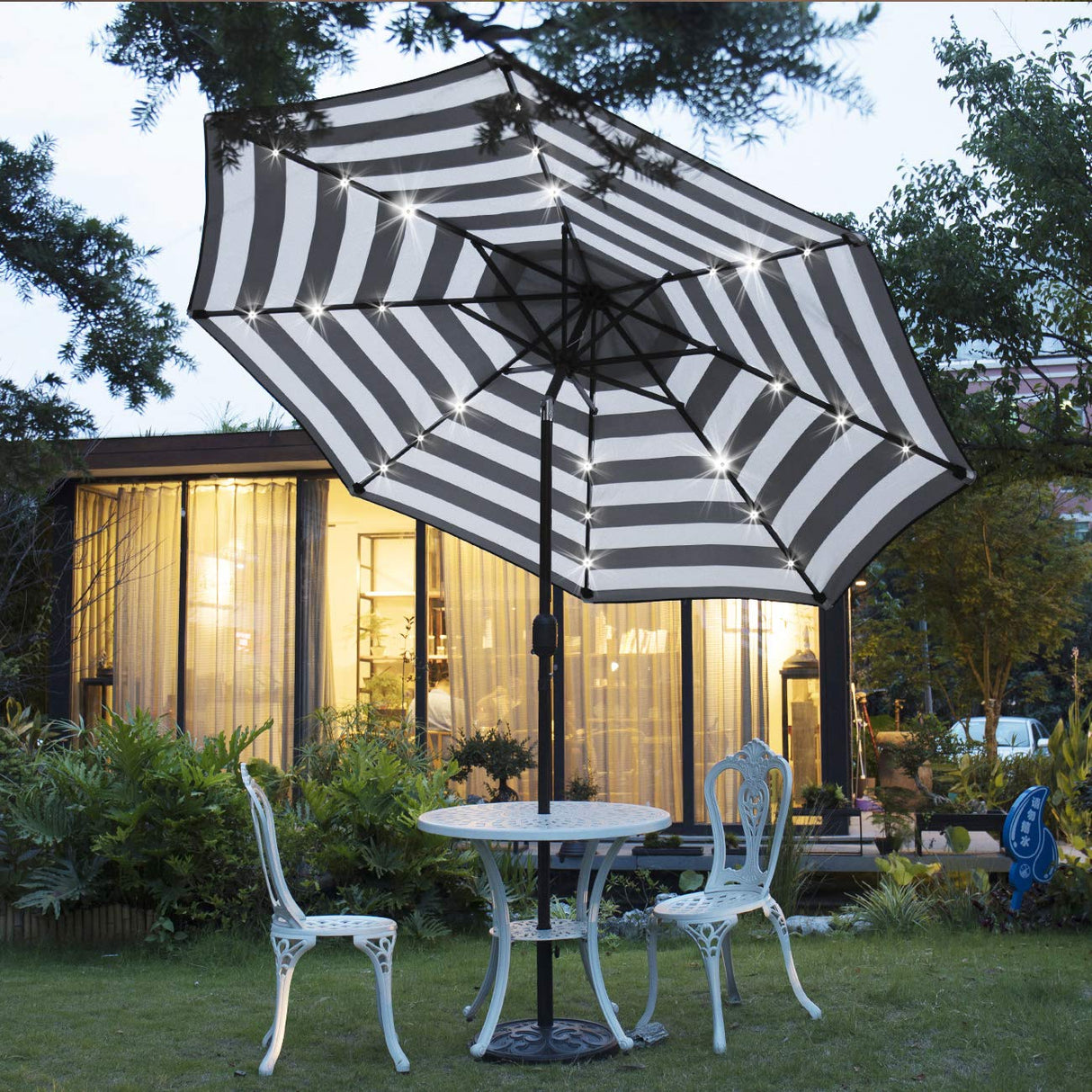 Sunnyglade 9' Solar 24 LED Lighted Umbrella with 8 Ribs Adjustment and Crank Lift System for Patio - Black and White Sunnyglade