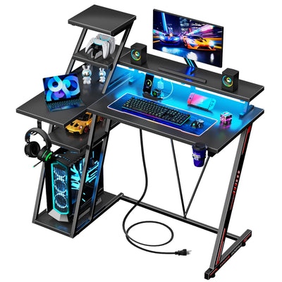 Korfile L Shaped Gaming Desk with LED Lights & Power Outlet, 39 Inch Computer Desk with Extra Storage Shelves, Reversible Gamer Workstations with Monitor Stand for Bedroom, Carbon Fiber Black