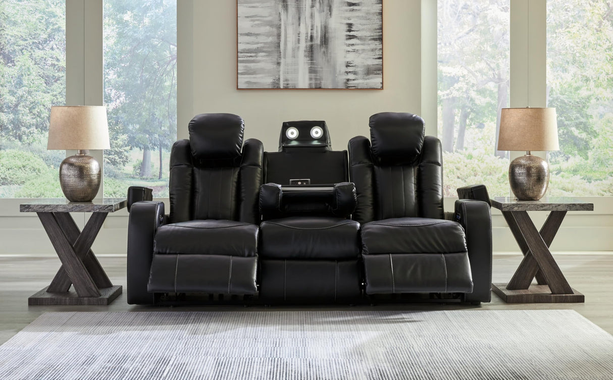 Signature Design by Ashley Caveman Den Modern Faux Leather Power Reclining Sofa with Adjustable Headrest, Drop Down Table, Electrical Outlets and LED Reading Lights, Black Signature Design by Ashley