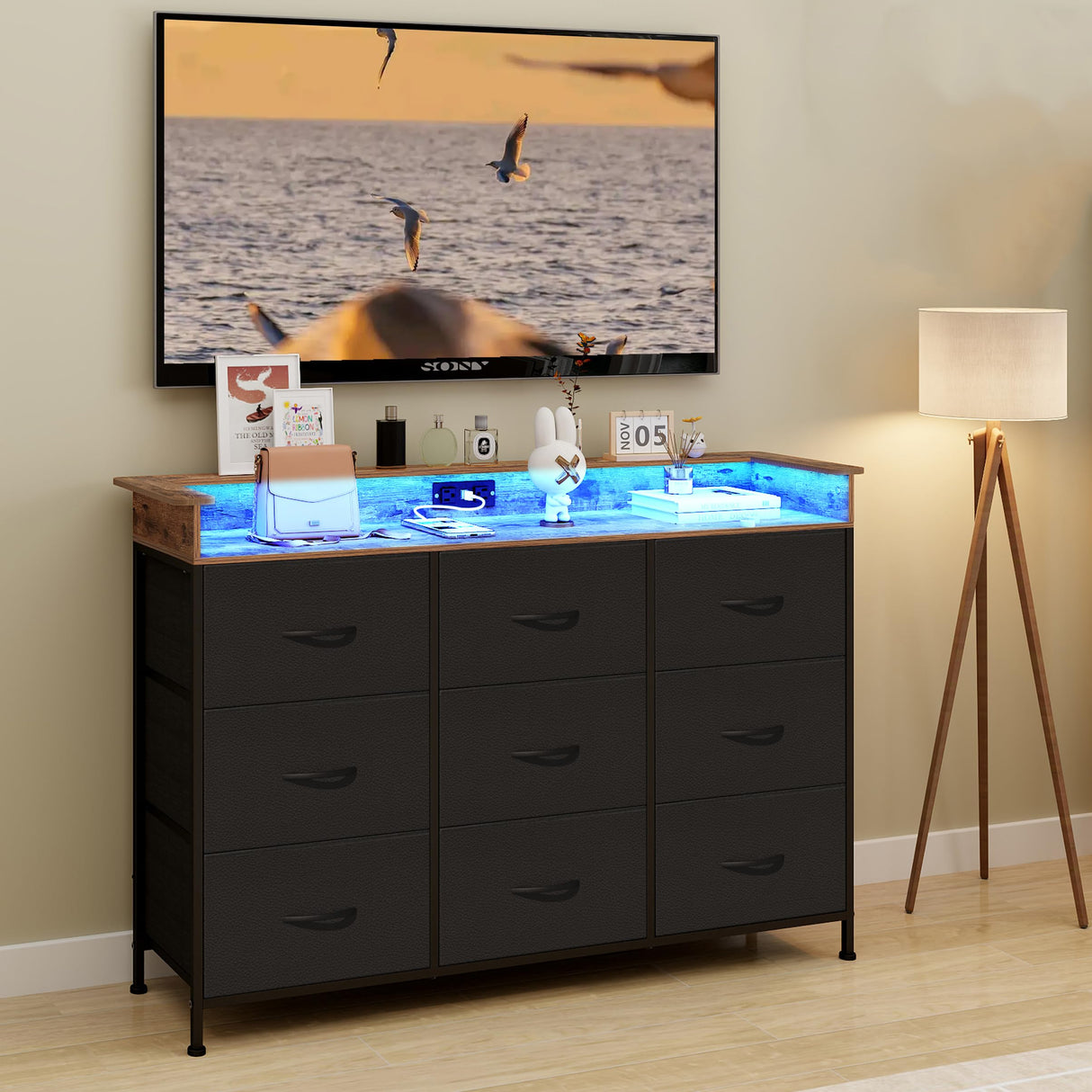 EXOTICA Black Dresser for Bedroom with Charging Station 9 Drawers Dresser with LED Light and USB Ports for Hallway Entryway Closets Sturdy Steel Frame Wood Top (Faux Leather Fabric Drawer) EXOTICA