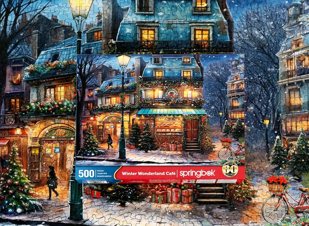 Springbok's Winter Wonderland Cafe 500 Piece Jigsaw Puzzle is a Picturesque Holiday Scene of a Cosy Cafe in The City Springbok
