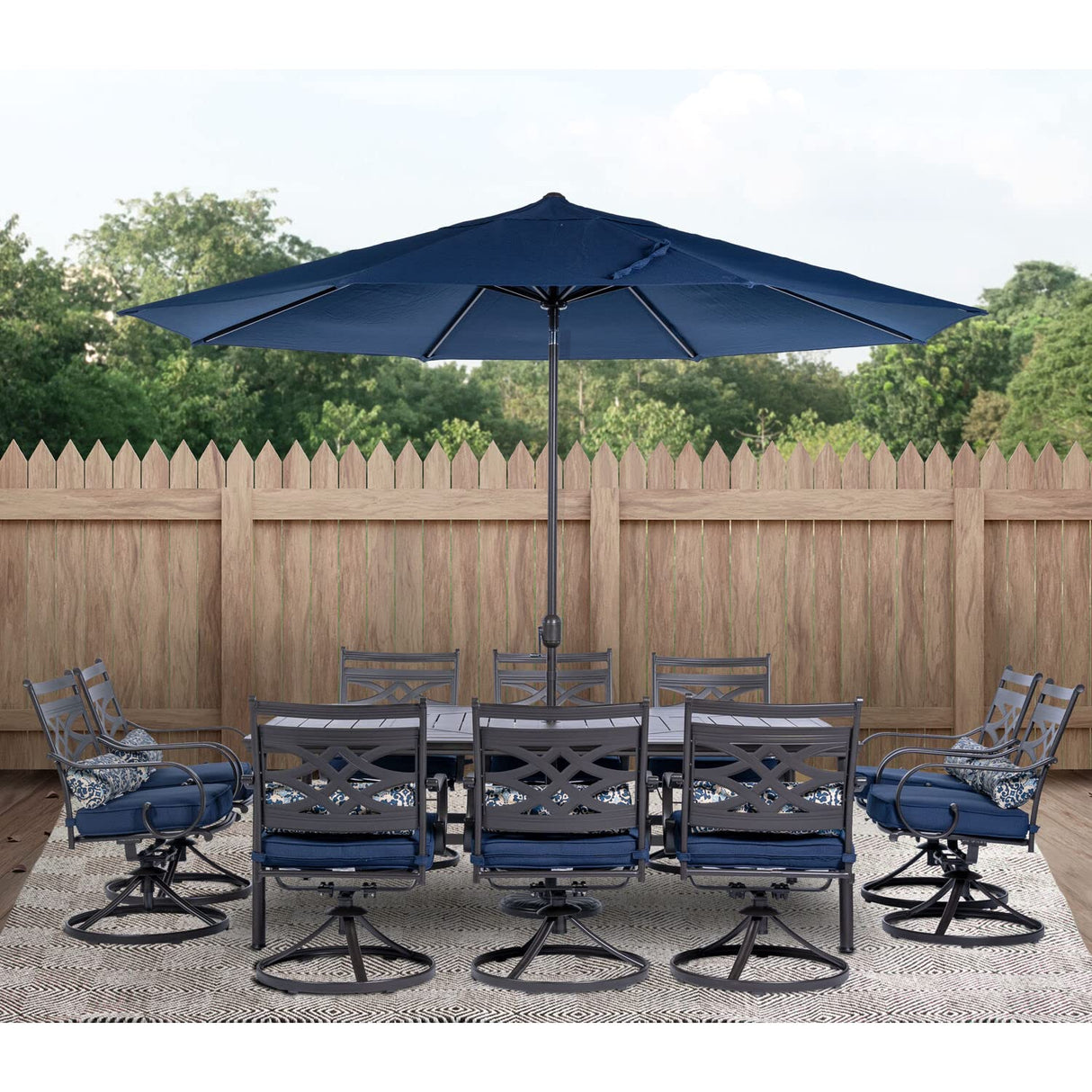 Hanover Montclair 11-Piece Outdoor Dining Set, All-Weather Outdoor Patio Dining Set, 10 Swivel Rocker Chairs with Seat and Lumbar Cushions, 84"x60" Stamped Rectangle Table, Umbrella, and Umbrella Base Hanover