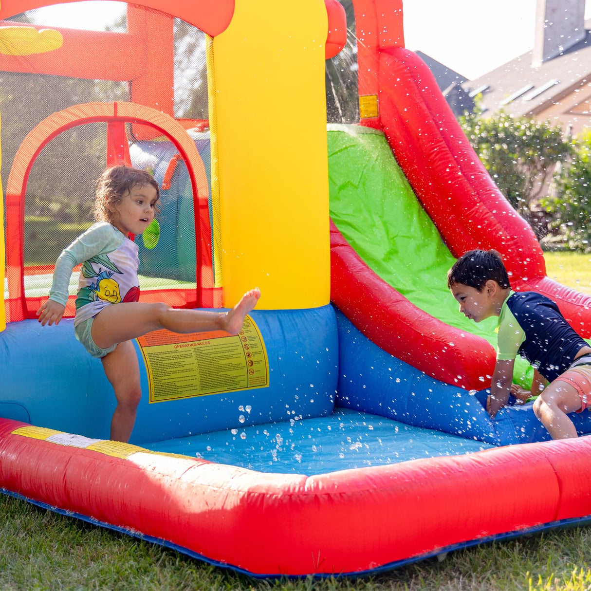 Bounceland Jump and Splash Adventure Bounce House or Water Slide All in one, Large Pool, Fun Bouncing Area with Basketball Hoop, Long Slide with Climbing Wall, UL Certified Blower Included Bounceland