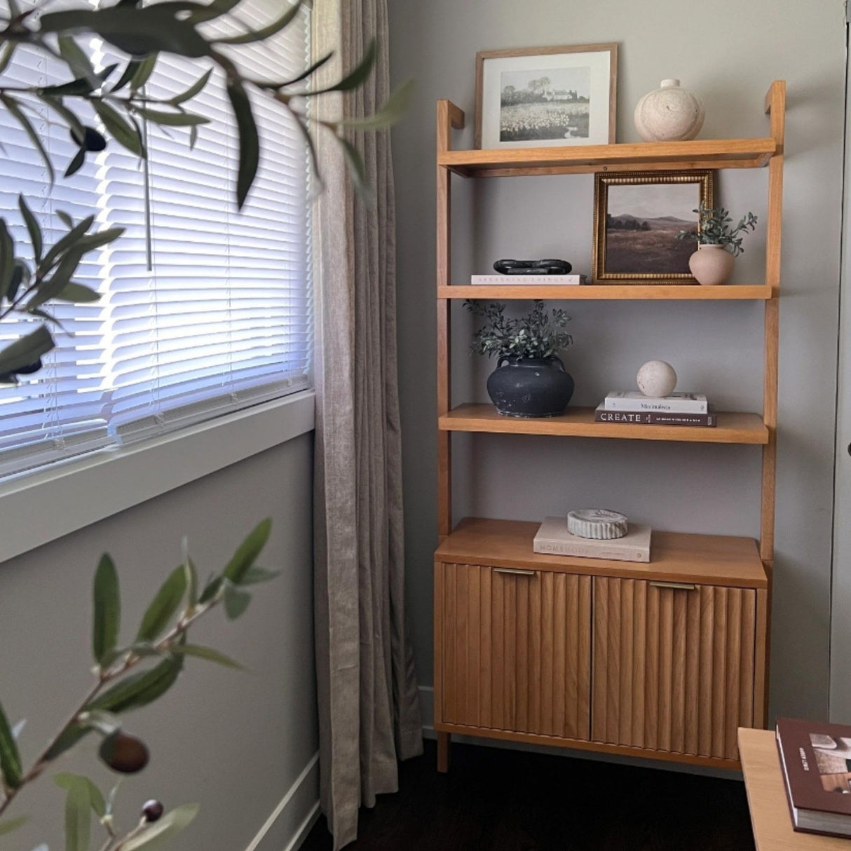 Nathan James Jasper 3-Shelf Solid Wood Boho Bookshelf, Wall Mounted Bookshelf with Cabinet with Fluted Doors, Natural Brown Nathan James