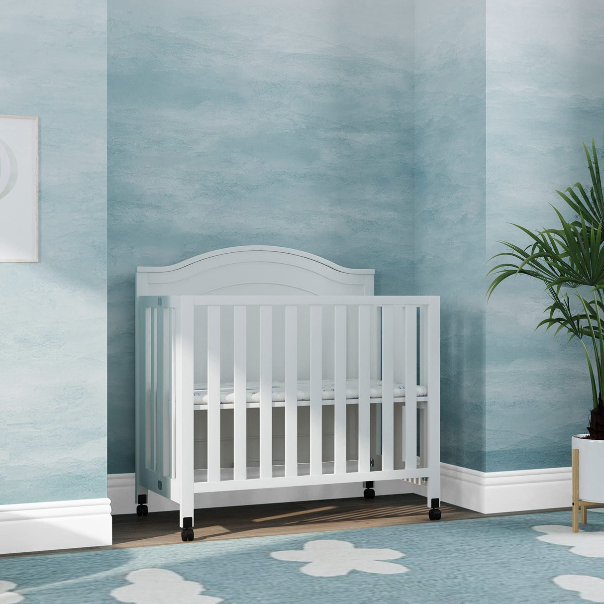 DaVinci Charlie Folding Portable 3-in-1 Convertible Mini Crib and Twin Bed in White, Removable Wheels, Greenguard Gold Certified DaVinci