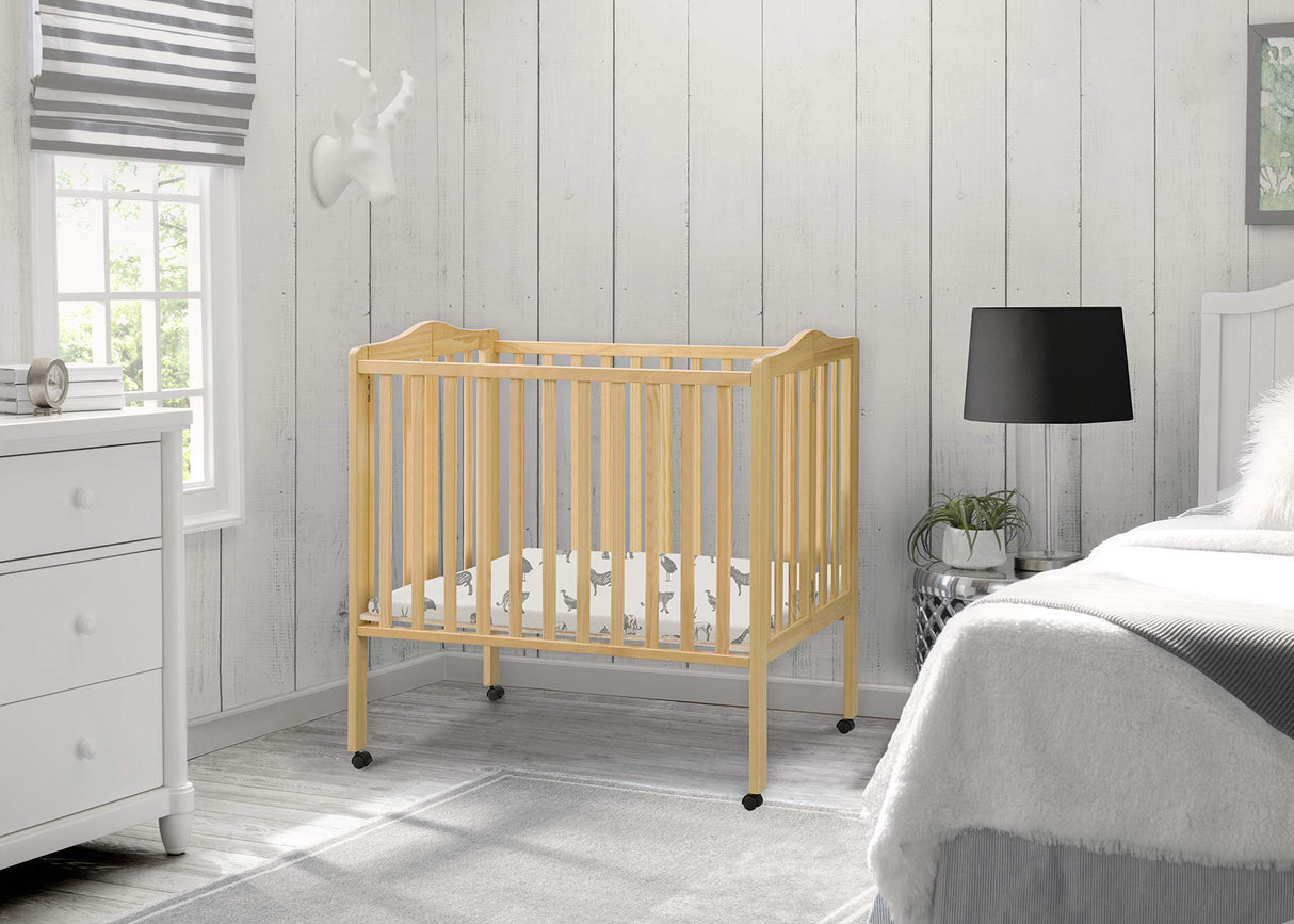 Delta Children Folding Portable Mini Baby Crib with 1.5-inch Mattress - Greenguard Gold Certified, Natural Delta Children
