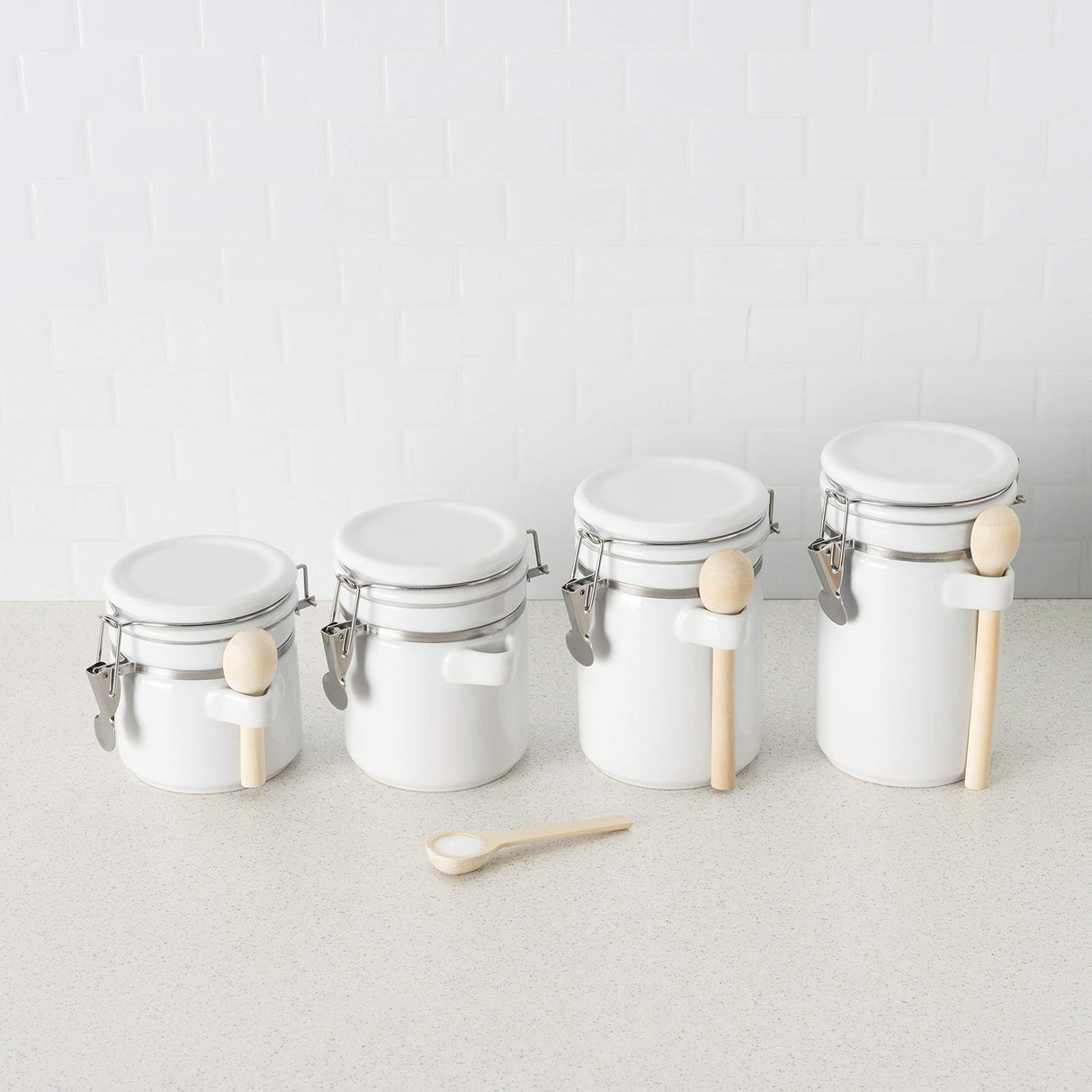 Canister Sets For The Kitchen (4 Piece Set) White, High Gloss Ceramic | By Home Basics | Decorative| With Wooden Spoons, Countertop Set For Flour, Sugar, Coffee, and Snacks Home Basics