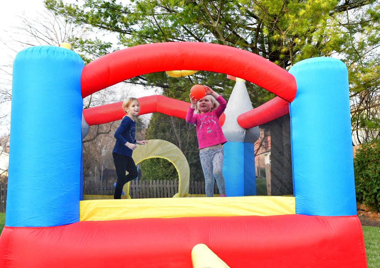 Bounceland Bounce House Castle with Basketball Hoop Inflatable Bouncer, Fun Slide, Safe Entrance Opening, UL Certified Strong Blower Included, 12 ft x 9 ft x 7 ft H Bounceland