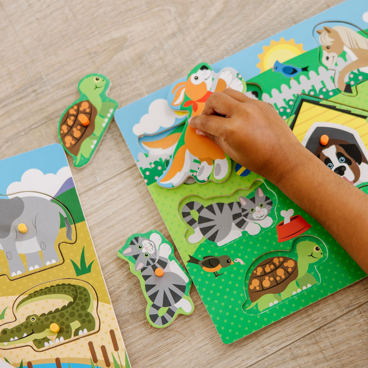 Melissa & Doug Wooden Peg Puzzle 4-Pack for Toddler and Preschool Boys and Girls – Vehicles, Farm, Safari, Pets Melissa & Doug