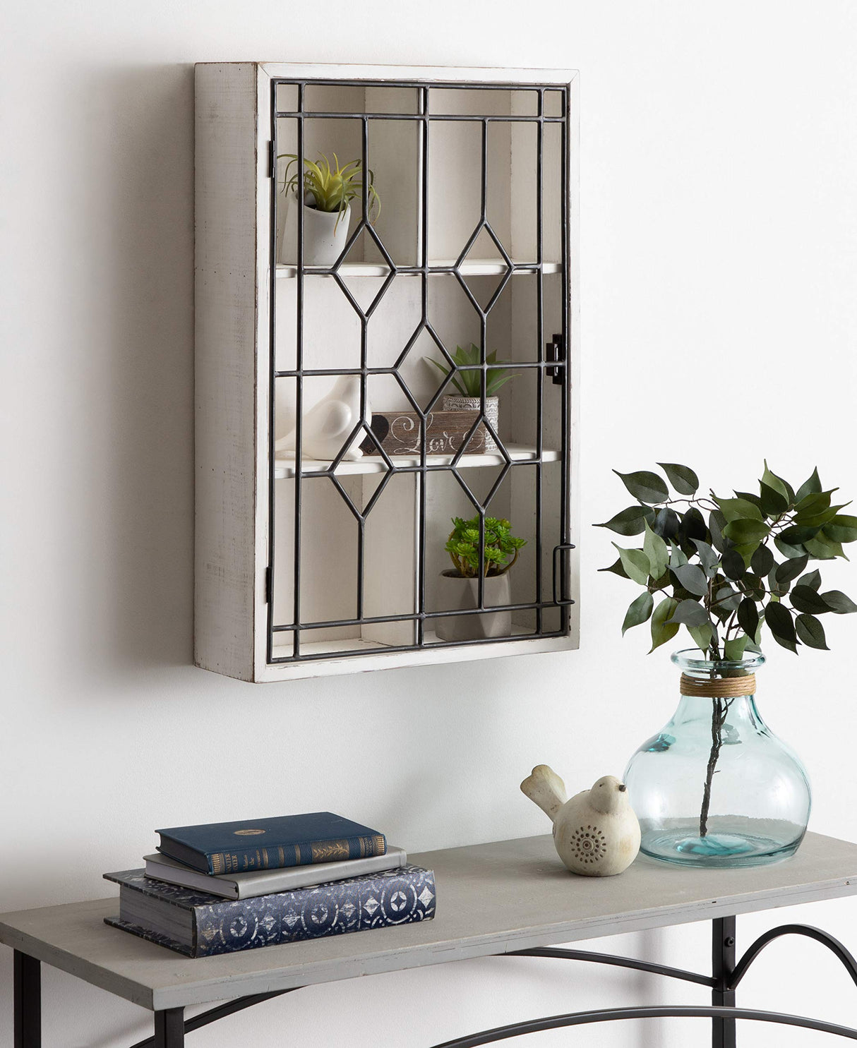 Kate and Laurel Megara Decorative Wooden Wall Hanging Curio Cabinet for Open Storage with Decorative Black Iron Door, Whitewash Finish Kate and Laurel