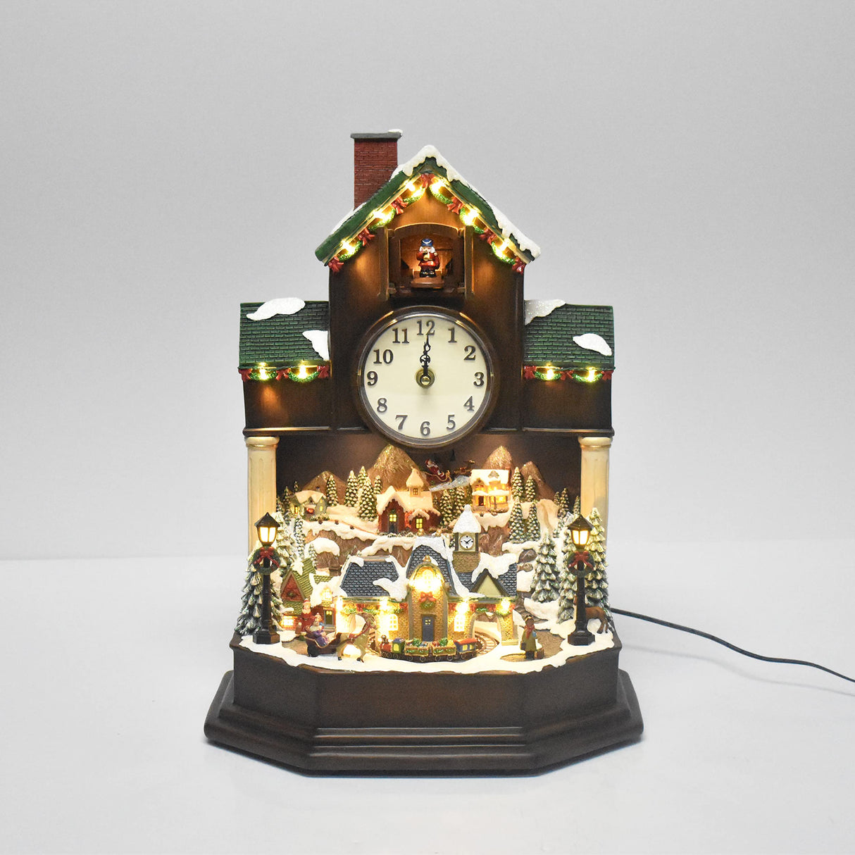 MOMENTS IN TIME 17.1" H Christmas Decor Cuckoo Clock with Christmas Village Scene, with LED Lights, Christmas Music, and Animation - Power Adapter (Included) MOMENTS IN TIME