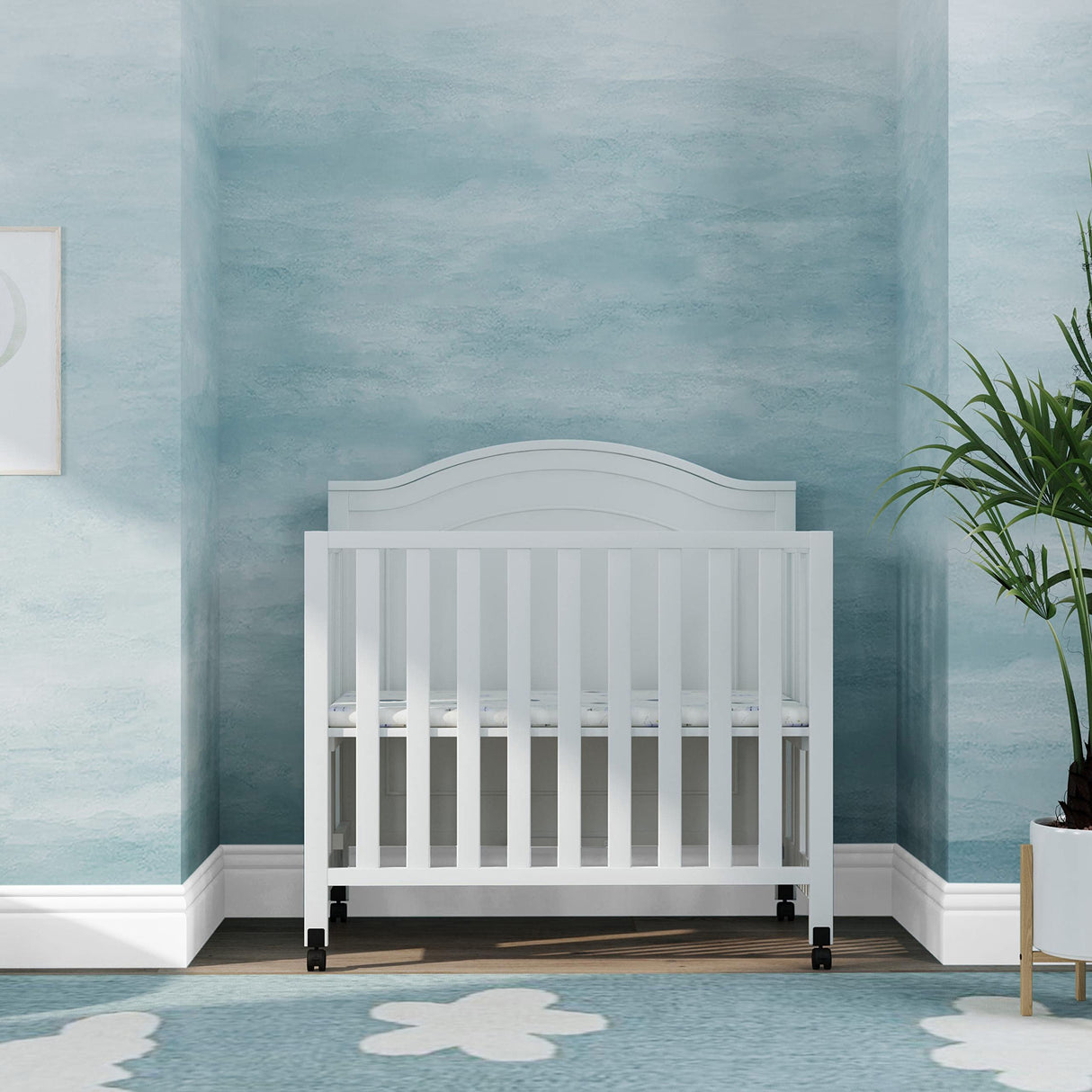DaVinci Charlie Folding Portable 3-in-1 Convertible Mini Crib and Twin Bed in White, Removable Wheels, Greenguard Gold Certified DaVinci
