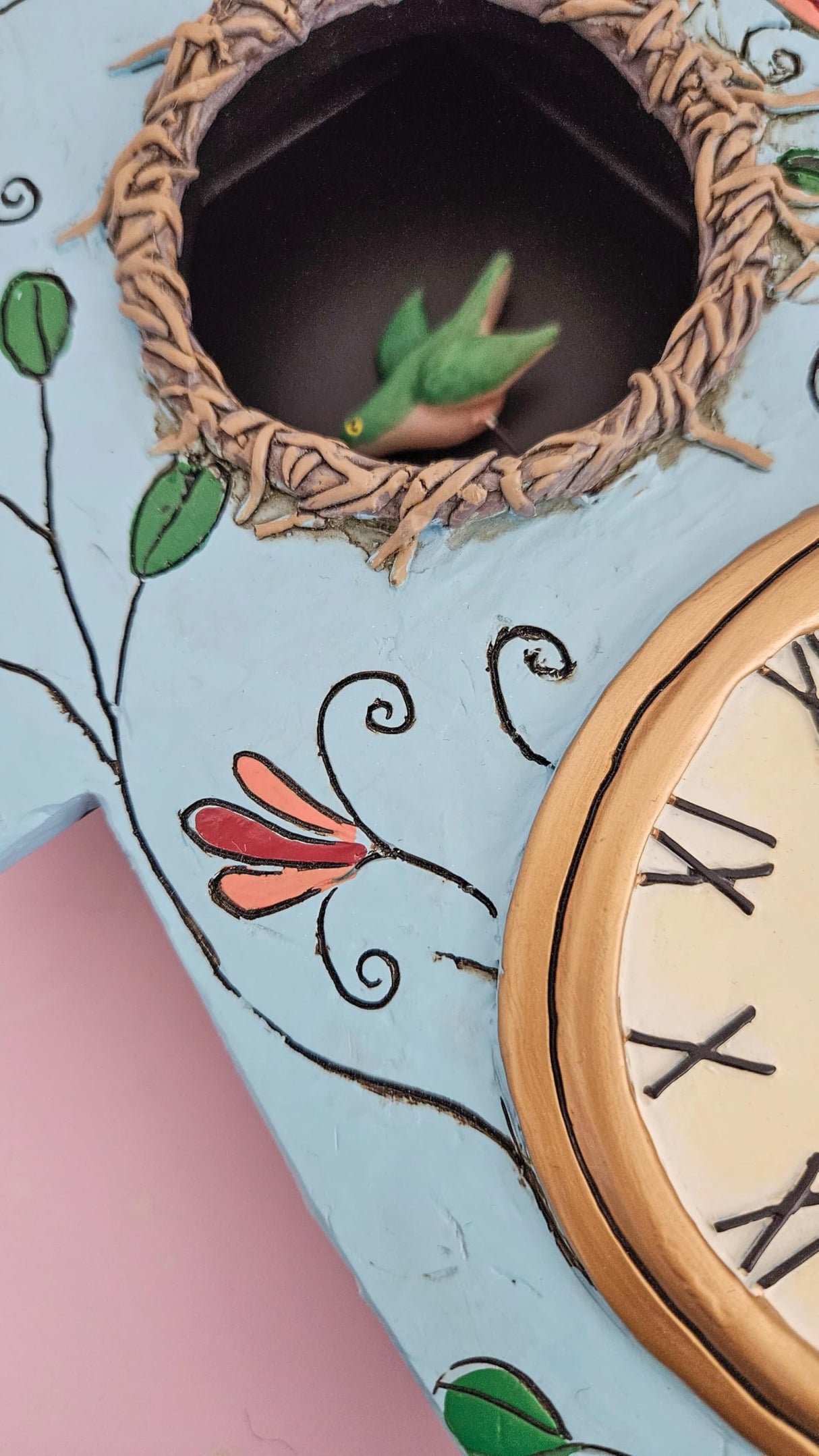 Enesco Allen Designs Birdhouse with Flowers Cuckoo Wall Clock - Battery Operated Pendulum Analog Clock, Stone Resin Decorative Clocks for Walls Home Decor Kitchen Clocks, 14.9 Inch Enesco
