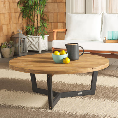 SAFAVIEH Outdoor Collection Leo Natural/Black Solid Wood Round Coffee Table