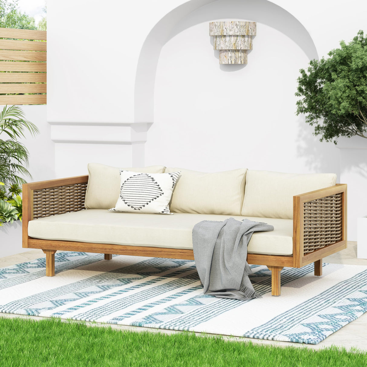 Christopher Knight Home Outdoor 3 Seater Acacia Wood Daybed with Fabric Water Resistant and Removable Cushions, Patio Garden Poolside Sofa with Wicker Armrest and Slat Paneling Back, Teak and Beige Christopher Knight Home