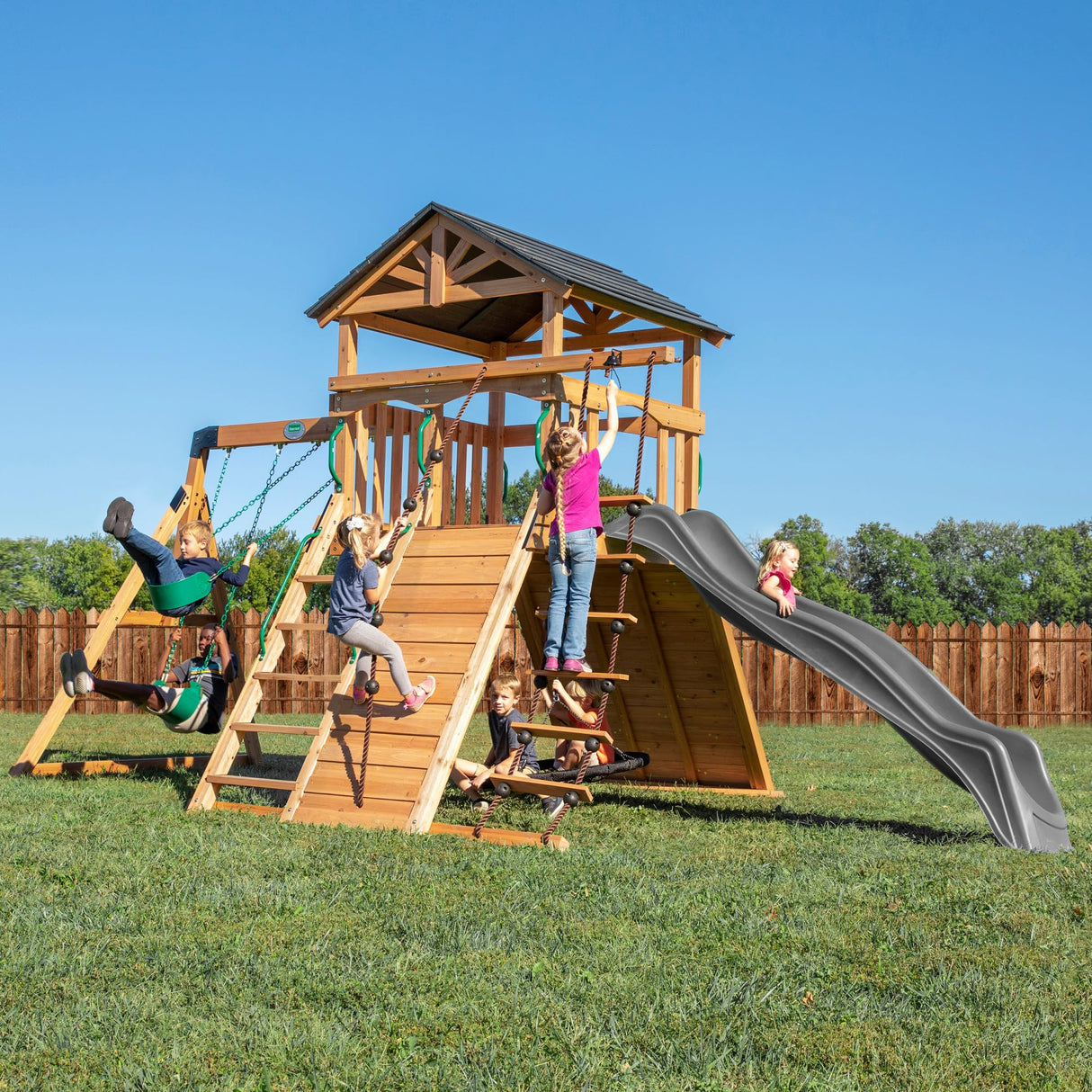 Backyard Discovery Endeavor All Cedar Wood Swing Set Playset with Gray Wave Slide for Backyard with Large Clubhouse Rope Ladder Rock Climbing Wall Wave Slide 2 Belt Swings and 1 Web Swing Gift Backyard Discovery