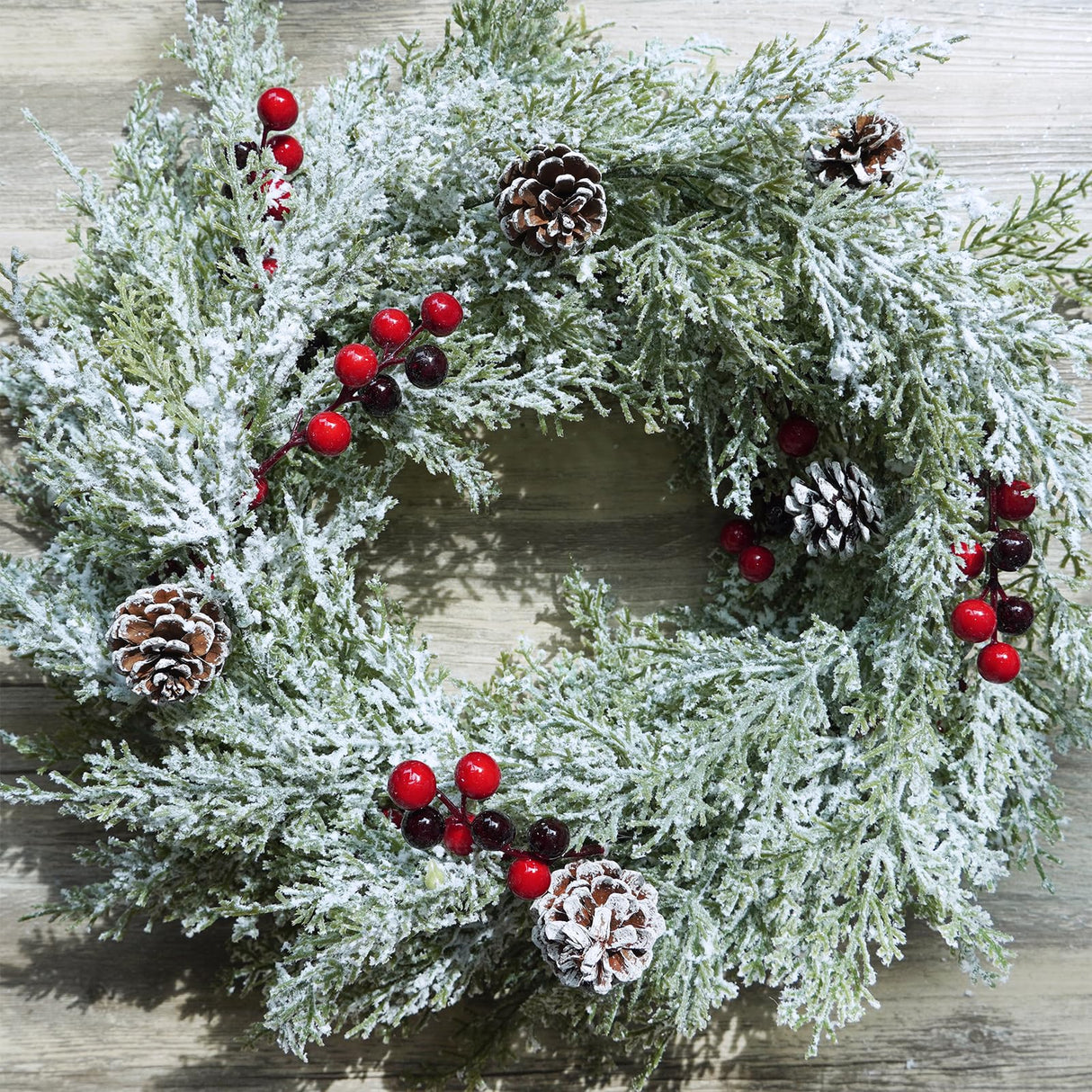 Winlyn Artificial Snowy Christmas Cedar Garland with Pine Cones and Red Berries Lush Christmas Greenery Garland 6' Long Christmas Wedding Winter Holiday Table Runner Centerpiece Seasonal Decoration Winlyn