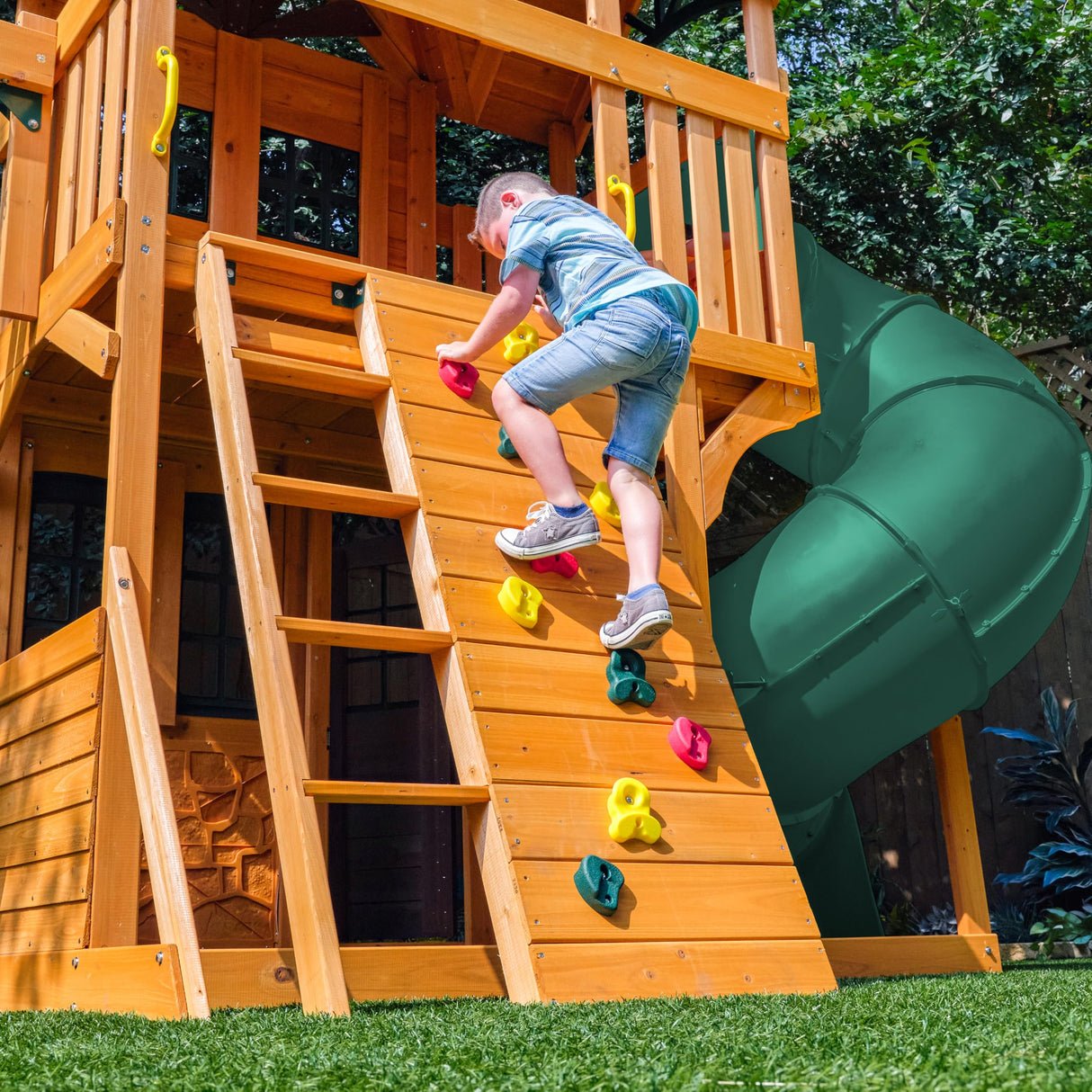 KidKraft Buffalo Crossing Wooden Swing Set with Playhouse, Rock Wall, Tube Slide and Glider KidKraft