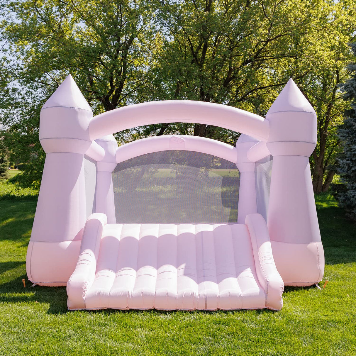 Bounceland Party Castle DayDreamer Cotton Candy Bounce House, 16.4 ft L x 13.1 ft W x 9.3 ft H, Basketball Hoop, UL Blower included, Trendy Pastel Color, Fun Slide & Bounce Area, Castle Theme for Kids Bounceland