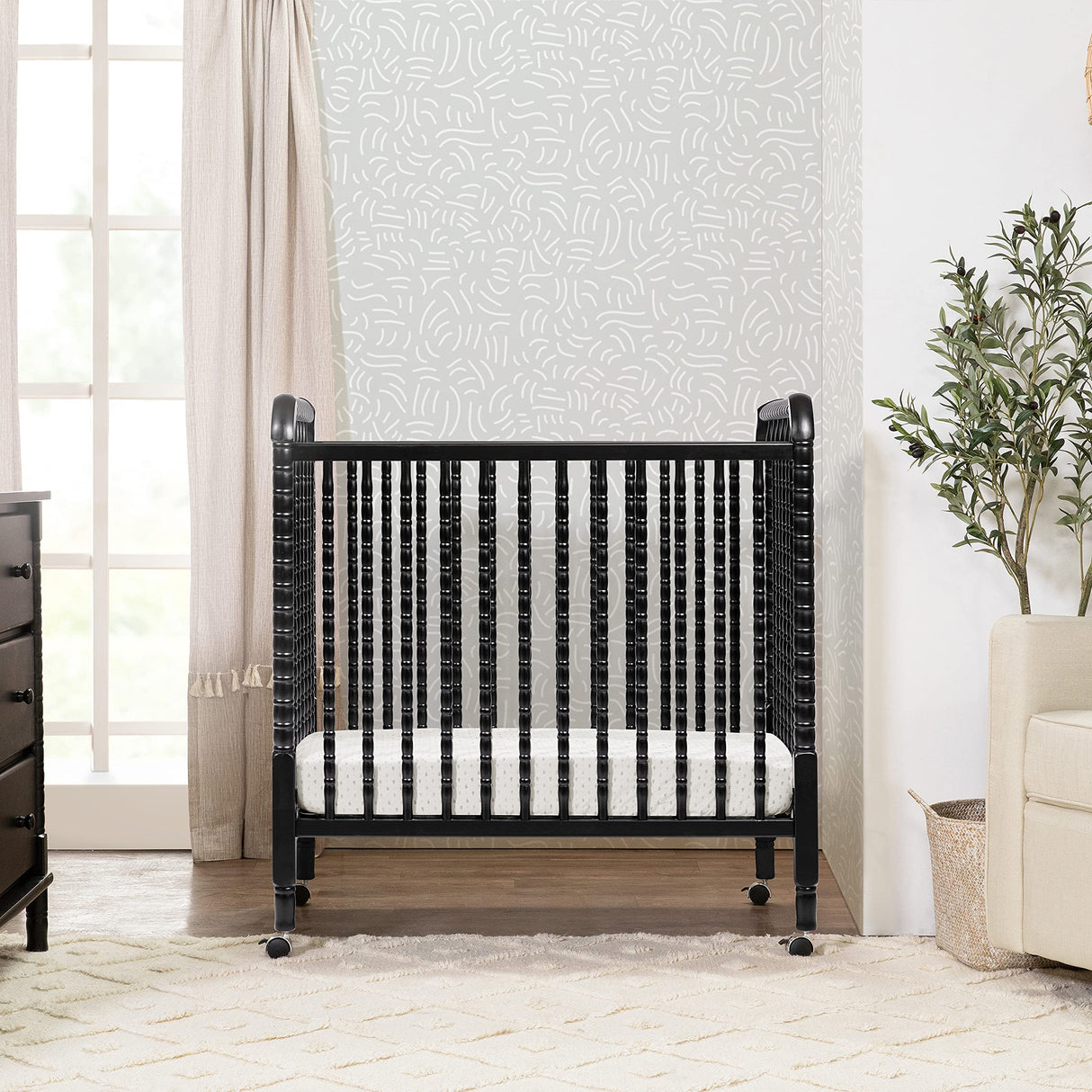 DaVinci Jenny Lind 3-in-1 Convertible Mini Crib in Ebony, Removable Wheels, Greenguard Gold Certified DaVinci