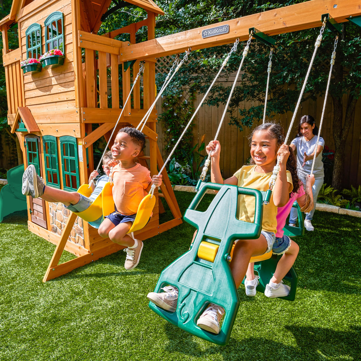 KidKraft Buffalo Crossing Wooden Swing Set with Playhouse, Rock Wall, Tube Slide and Glider KidKraft