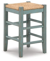 Signature Design by Ashley Mirimyn Farmhouse 23.63" Counter Height Bar Stool with Woven Wicker Seats, 2 Count, Green & Light Brown Signature Design by Ashley