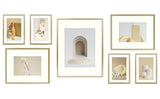 Frametory, Aluminum Picture Frames Set of 7 - Gold Gallery Wall Kit - Displays One 11x14, Two 8x10, and Four 5x7 inch Photos for Home Decoration Frametory