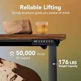 HUANUO 71 x 30 inch Electric Standing Desk Adjustable Height, 4 Memory Height Settings, Sit Stand Up Desk for Home Office & Computer Workstation, Black Walnut HUANUO