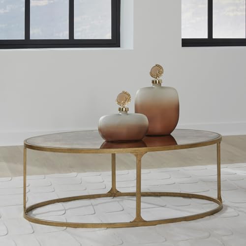 Signature Design by Ashley Korajane Oval Coffee Table with Tempered Glass Top, Faux Marble Finish, Steel Frame, 48" W x 27.38" D x 17.5" H, Antique Gold Signature Design by Ashley
