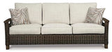Signature Design by Ashley Paradise Trail Outdoor Patio Sofa with Cushion and 2 Pillows, Brown & Beige Signature Design by Ashley
