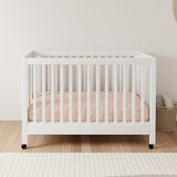 Babyletto Maki 2-in-1 Baby Crib Convertible to Toddler Bed - GREENGUARD Gold Certified Portable Folding Wood Crib w/ Toddler Conversion Kit - 4 Adjustable Heights, Easy to Assemble - White