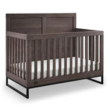 Simmons Kids Foundry 6-in-1 Convertible Baby Crib, Rustic Grey with Matte Black Delta Children