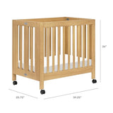 Babyletto Origami Mini Portable Crib Folding with Wheels in Honey, 2 Adjustable Mattress Positions, Greenguard Gold Certified babyletto