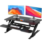 HUANUO 36" Z Shaped Stable Standing Desk Converter, Height Adjustable Sit Stand Up Desk Riser, Dual Monitor and Laptop Workstation with Wide Keyboard Tray, Desk Lifter for Home Office HUANUO