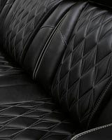 Signature Design by Ashley Boyington Modern Leather Match Power Reclining Loveseat with Console, Adjustable Headrest, Massage, Heated Seat and LED Lights, Black Signature Design by Ashley