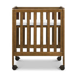 DaVinci Carter's Colby Grow 6-in-1 Convertible Bassinet to Crib in Walnut, GREENGUARD Gold Certified, Removable Wheels DaVinci