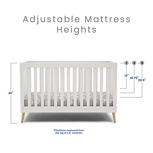 Delta Children Essex 4-in-1 Convertible Baby Crib, Bianca White with Natural Legs - WoodArtSupply