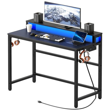 YATINEY Small Computer Desk with Charging Station and LED Lights, Gaming Desk with Monitor Stand, 2-Tier Home Office Desk with 4 Side Hooks, for Living Room, Home Office, Black DN01UDBBY2 YATINEY